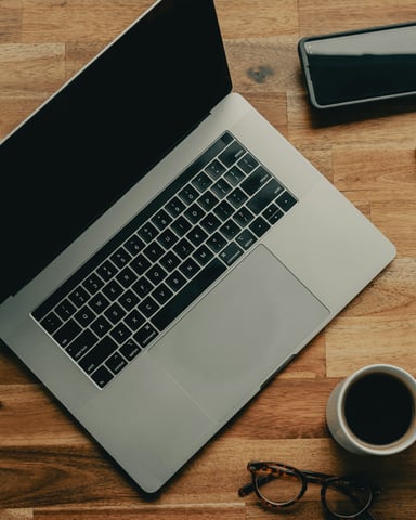 Laptop on a wooden desk